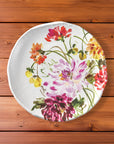 Garden Brights Collection by Kelly Ventura White 10.75 inch melamine plate on a wood table