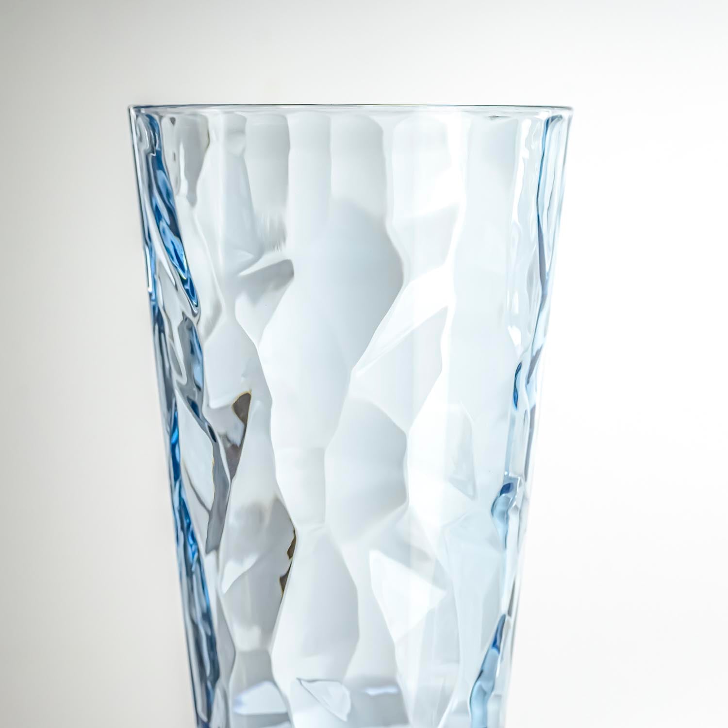 17-ounce blue acrylic tumbler glass from the Merritt Designs Cascade collection. Detailed view on white background
