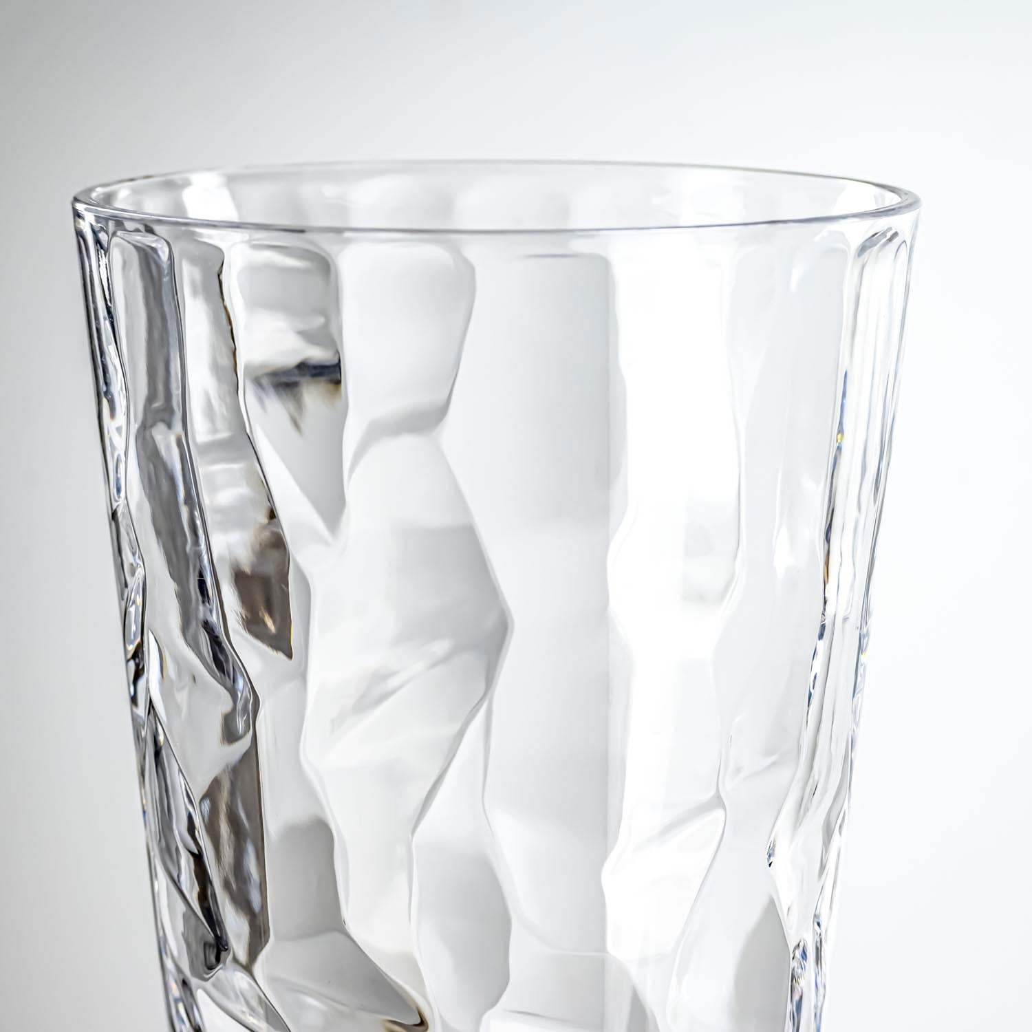 17-ounce clear acrylic tumbler glass from the Merritt Designs Cascade collection. Detailed view on white background