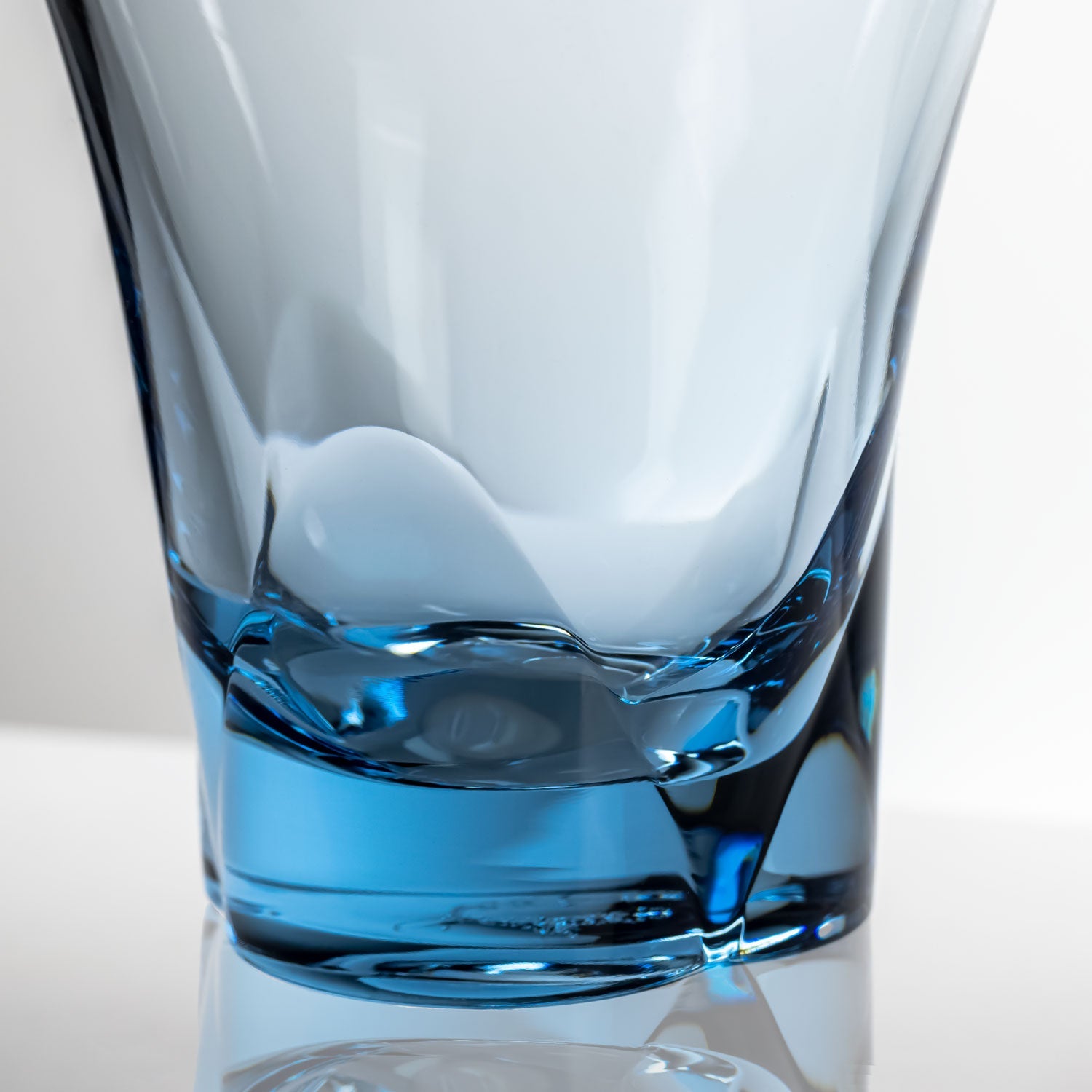 10-ounce blue acrylic tumbler in the Fiori collection by Merritt Designs. Detailed view on white background