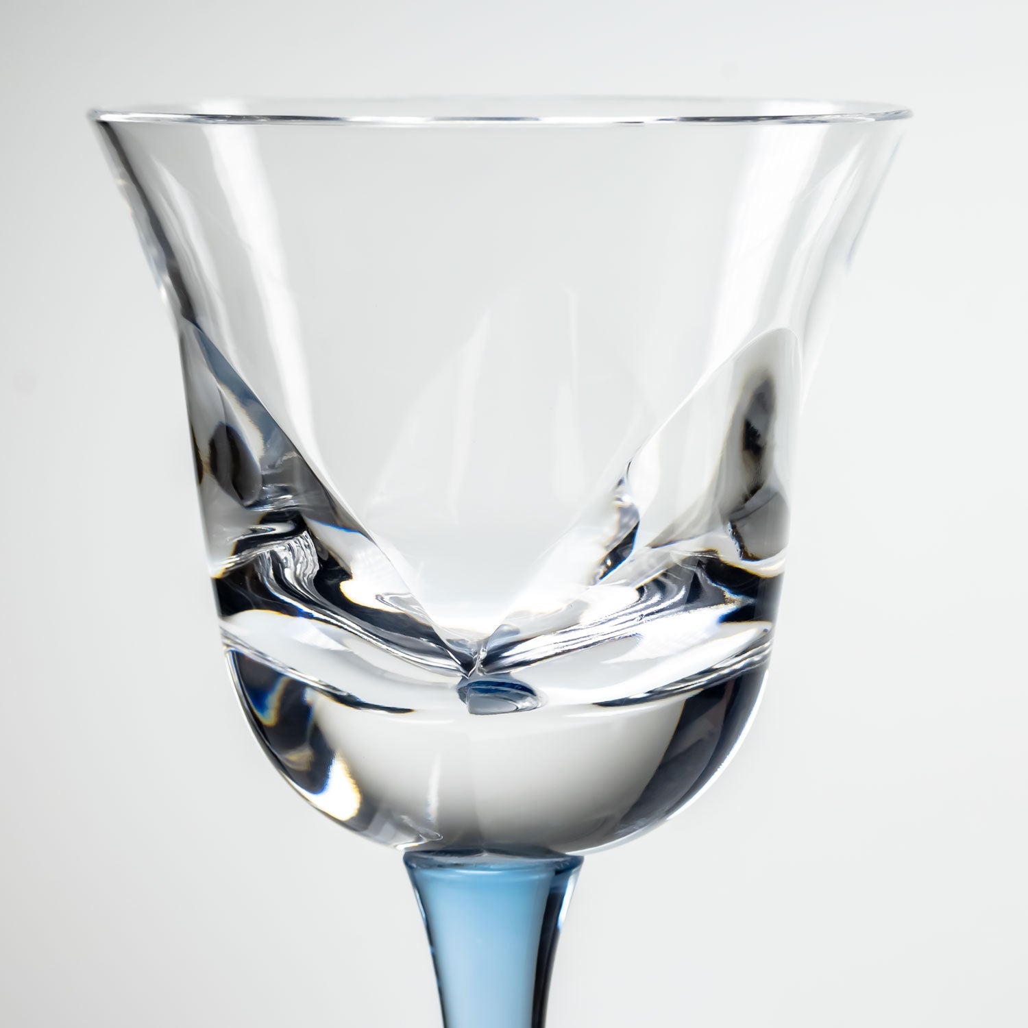 10-ounce blue acrylic wine glass in the Fiori collection by Merritt Designs. Detailed view on white background