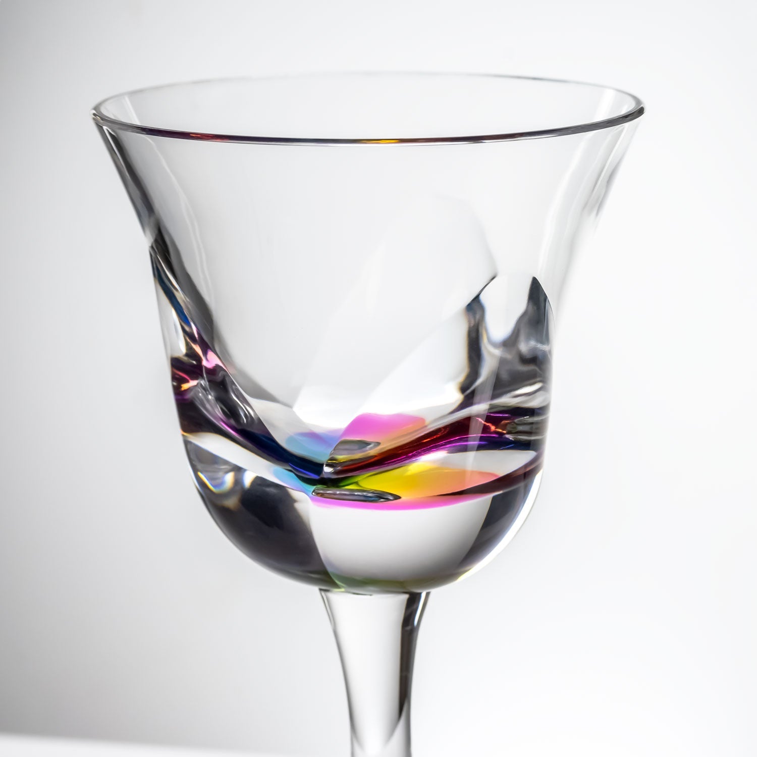 10-ounce rainbow acrylic wine glass in the Fiori collection by Merritt Designs. Detailed view on white background