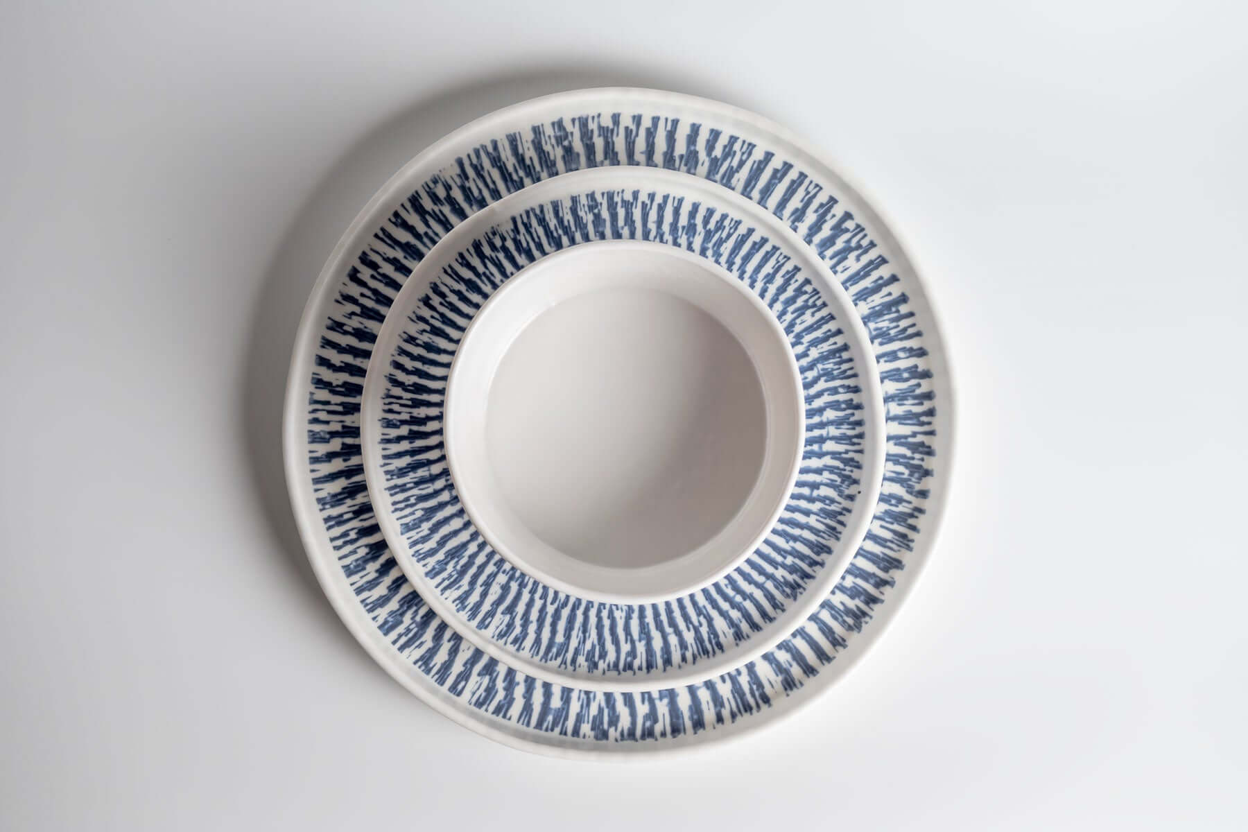 merritt designs tribal blue plates        
        <figure class=