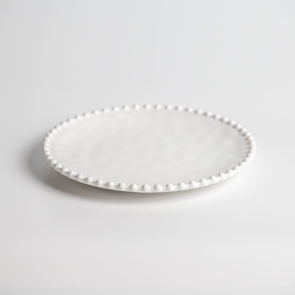 Cream colored, 8-inch round melamine salad plate, front view