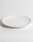 Cream colored, 8-inch round melamine salad plate, front view