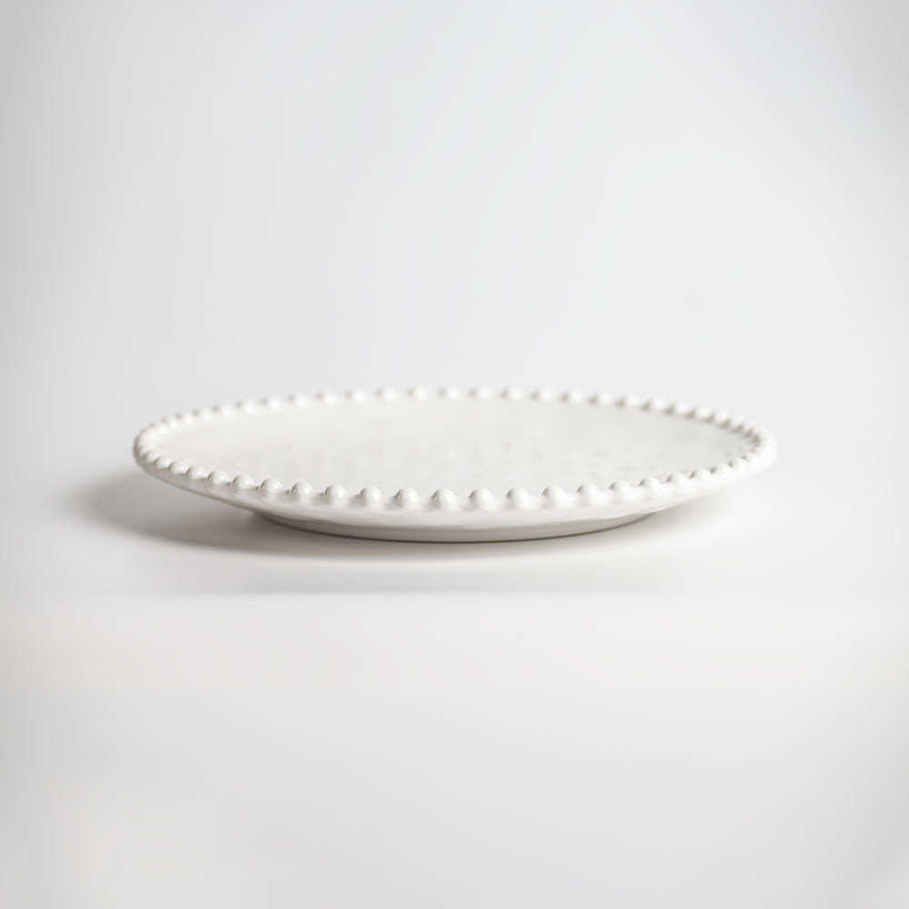 Cream colored, 8-inch round melamine salad plate, front view