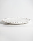 Cream colored, 8-inch round melamine salad plate, front view