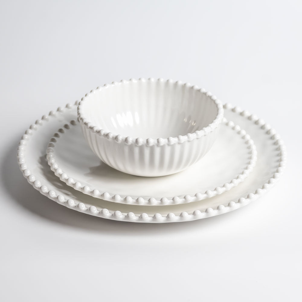 Cream colored, 6-inch round melamine salad bowl, salad plate and dinner plate with beaded rim, front view