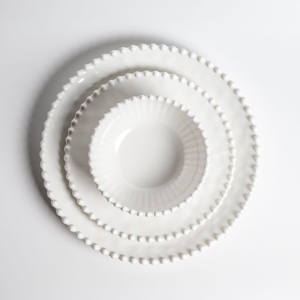 Merritt Designs Beaded Pearl Melamine Dinnerware Collection stacked Salad Bowl Salad Plate and Dinner Plate viewed from the top on a white background