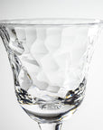 12-ounce clear acrylic wine glass from the Merritt Designs Cascade collection. Detailed view on white background
