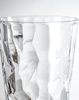 17-ounce clear acrylic tumbler glass from the Merritt Designs Cascade collection. Detailed view on white background