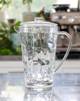 Clear, 64-ounce acrylic pitcher from the Merritt Designs Cascade collection on a kitchen counter